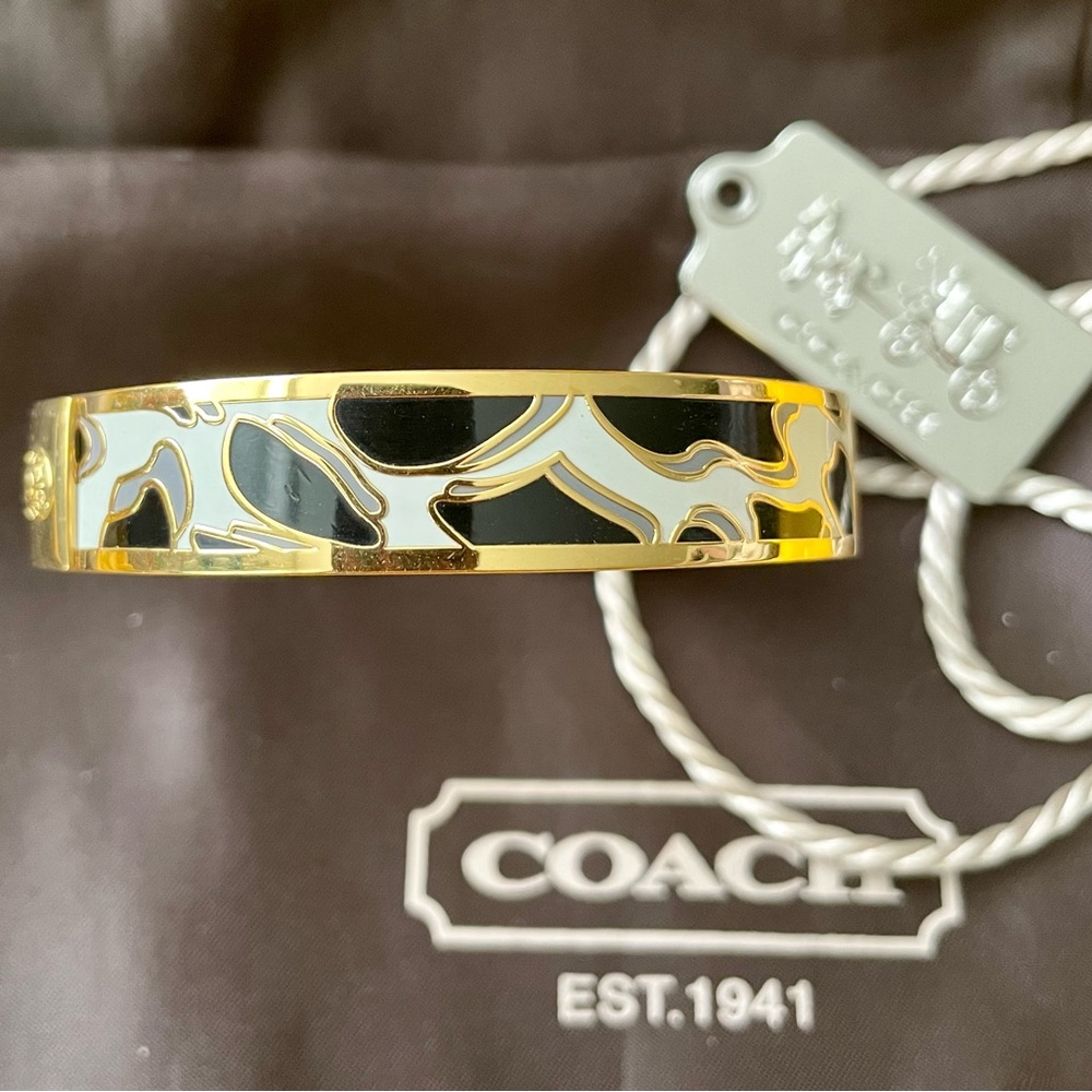 Coach gold tone bracelet with a beautiful design. Sold out!
